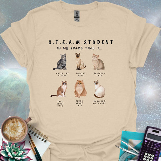 T-shirt design featuring six cat illustrations with the text 'S.T.E.A.M. Student - In My Spare Time, I...' and various cat-related activities.