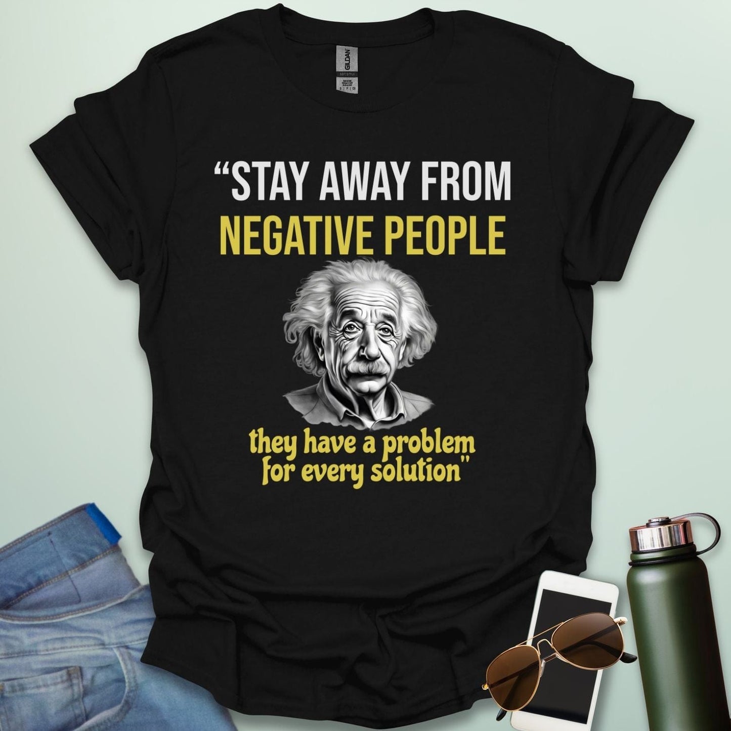 T-shirt with a portrait of Albert Einstein and the quote 'Stay away from negative people. They have a problem for every solution.'