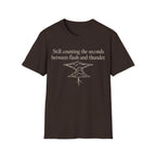 BETWEEN FLASH AND THUNDER T-Shirt