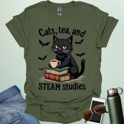 Cats, Tea, and STEAM Studies t-shirt with black cat, books, tea cup, and bats — a cozy geeky design for STEM/STEAM fans and book lovers.