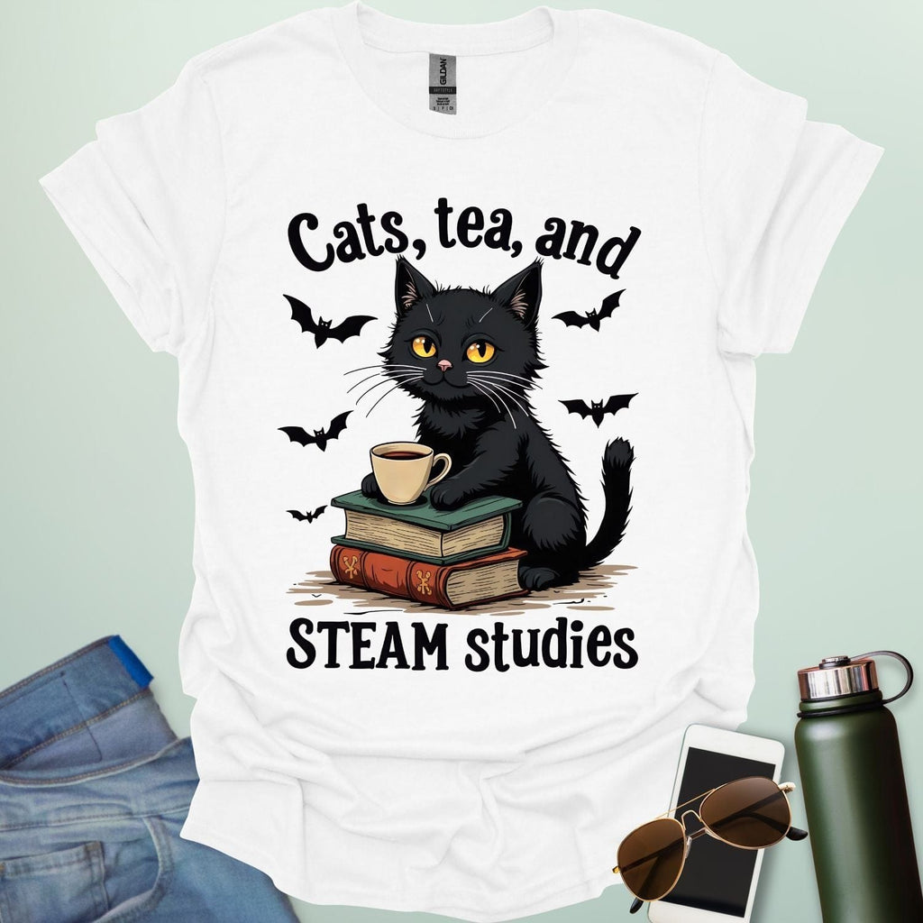 Cats, Tea, and STEAM Studies t-shirt with black cat, books, tea cup, and bats — a cozy geeky design for STEM/STEAM fans and book lovers.