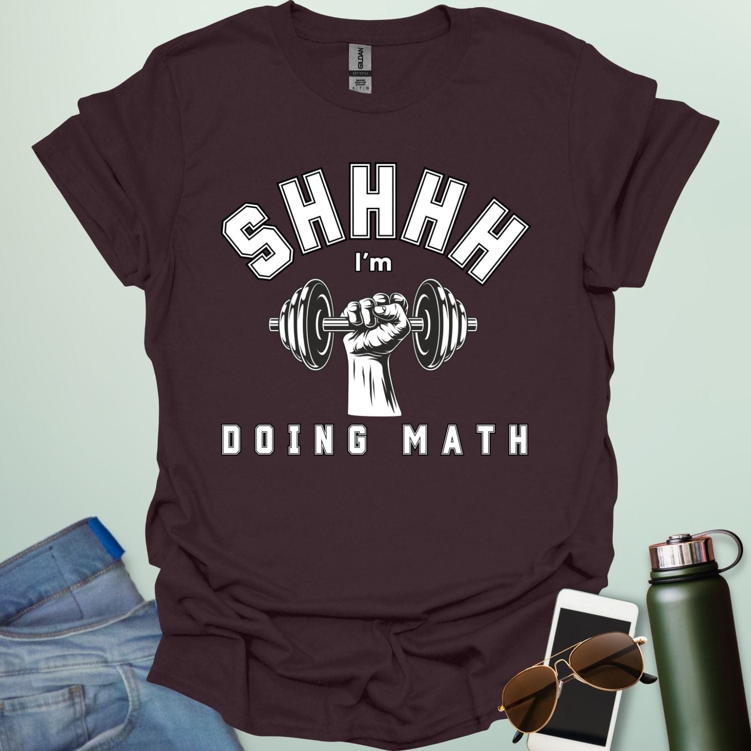 Shhhh… I’m Doing Math t-shirt featuring a retro-style weight plate graphic (45, 15, 20) with distressed text—funny gym-math mashup for fitness and math fans.