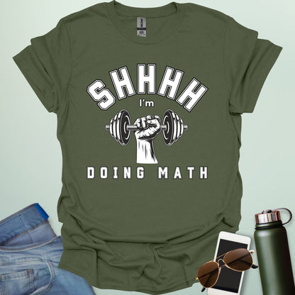 Shhhh… I’m Doing Math t-shirt featuring a retro-style weight plate graphic (45, 15, 20) with distressed text—funny gym-math mashup for fitness and math fans.