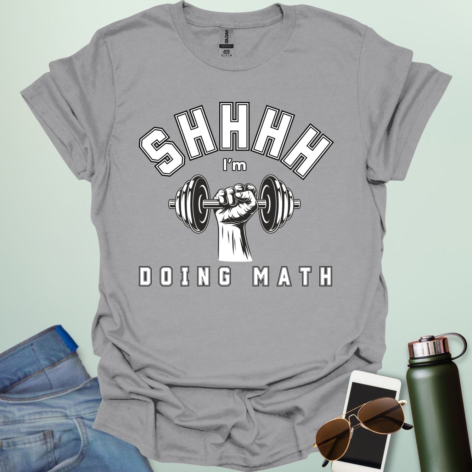 Shhhh… I’m Doing Math t-shirt featuring a retro-style weight plate graphic (45, 15, 20) with distressed text—funny gym-math mashup for fitness and math fans.