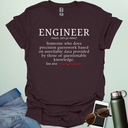 Engineer' t-shirt with a humorous dictionary-style definition and 'See also wizard, magician' in red.