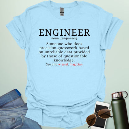 Engineer' t-shirt with a humorous dictionary-style definition and 'See also wizard, magician' in red.