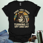 Funny 'Have You Tried Turning It Off and On' t-shirt with a retro-style cat at a computer.