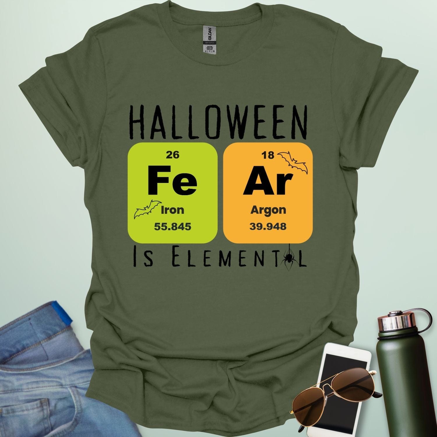 Fear Is Elemental t-shirt with periodic-table / chemistry element graphics — a Halloween science pun design for STEM fans.